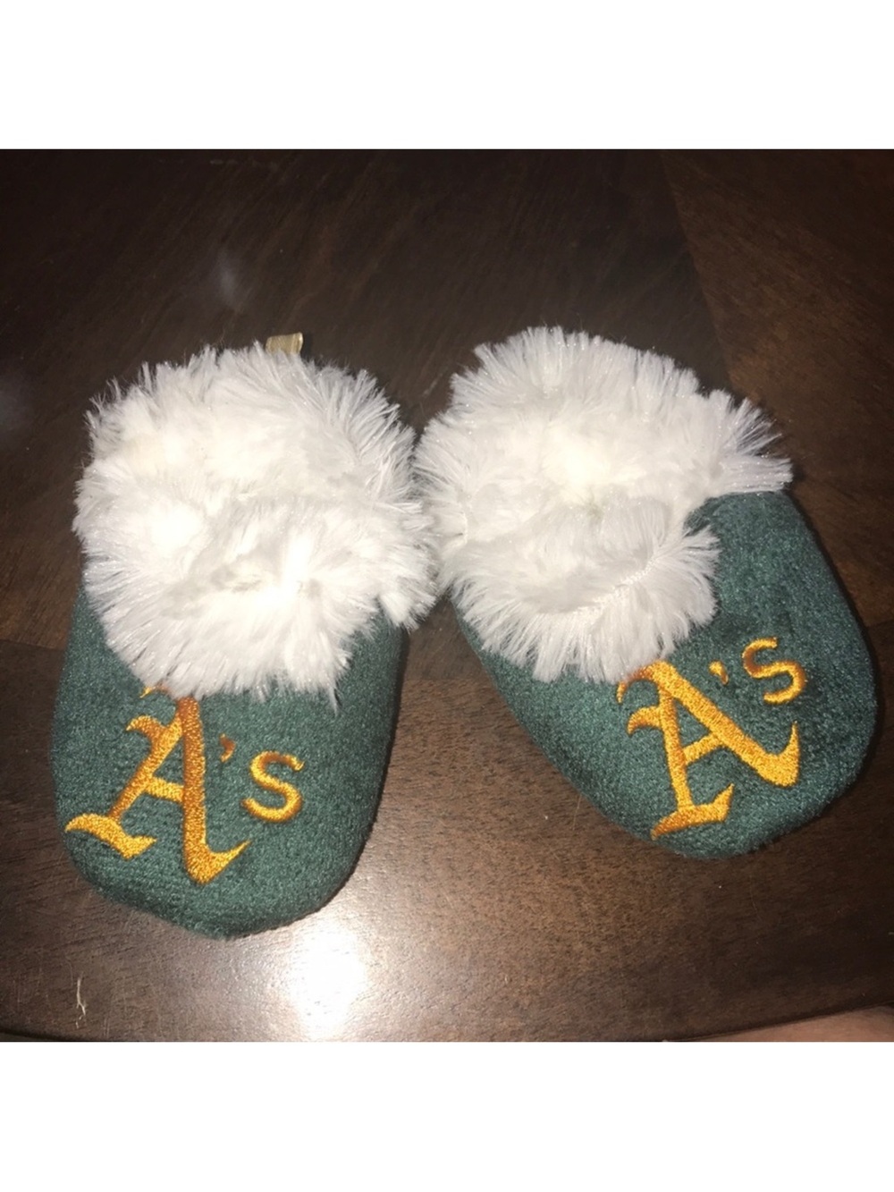 Forever collectibles small Green Baby furry Booties with Yellow A's Logo